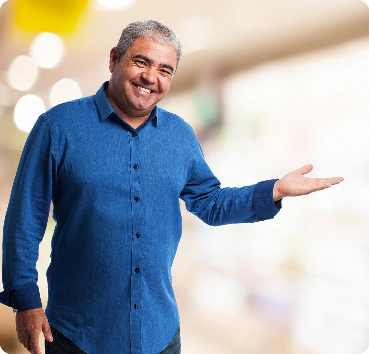 Smiling middle-aged man gesturing confidently – representing satisfaction and health benefits of Morning Walker